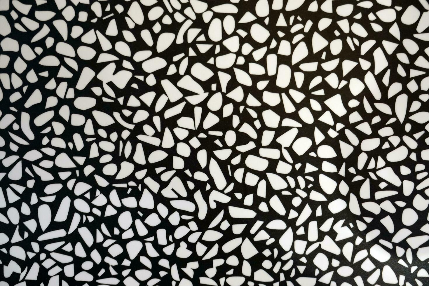 White and black terrazzo floor texture background. Abstract pattern. photo