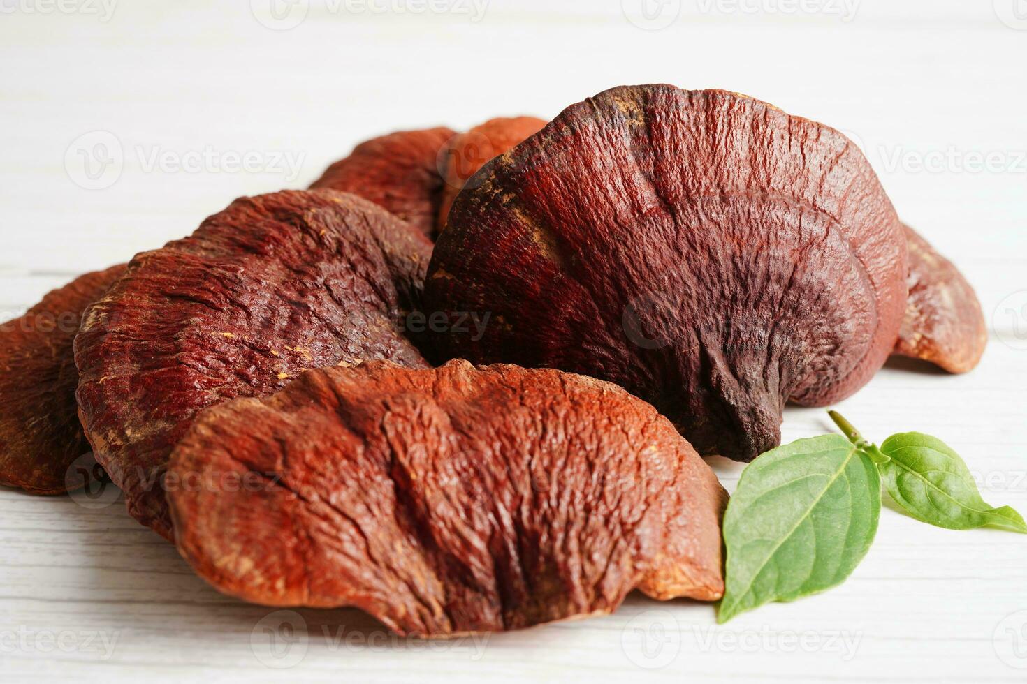 Lingzhi or Reishi mushroom with capsules, organic natural healthy food. photo