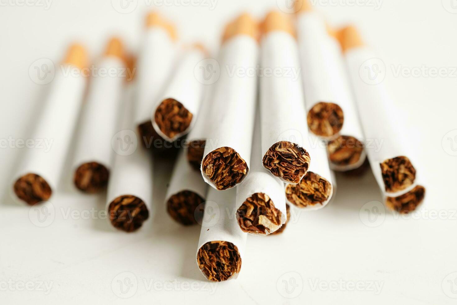 Cigarette, roll tobacco in paper with filter tube, No smoking concept. photo