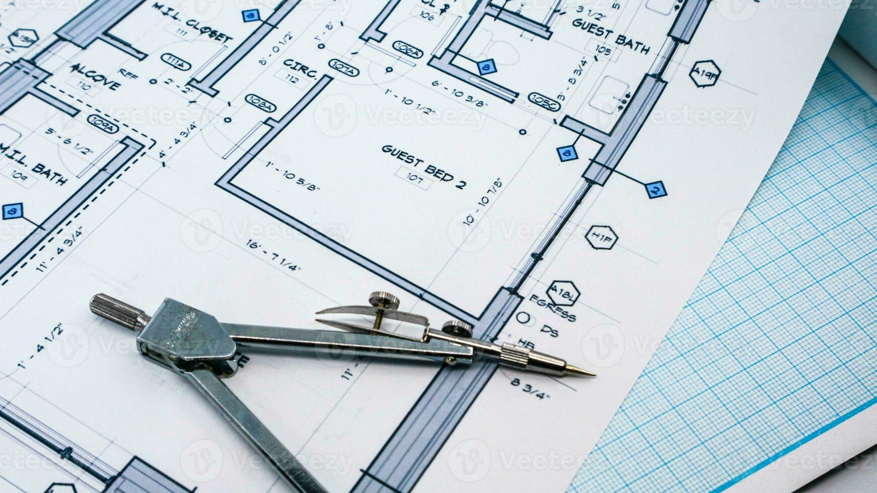 Office blue print with drawing compass and ruler photo