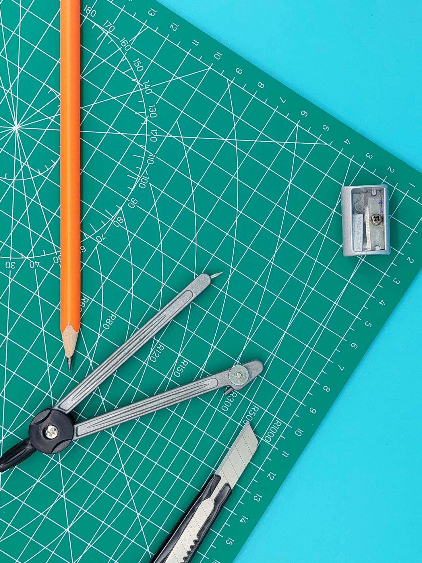 Green Cutting mats , Pen drawings , adjust angle tool , scale ruler on