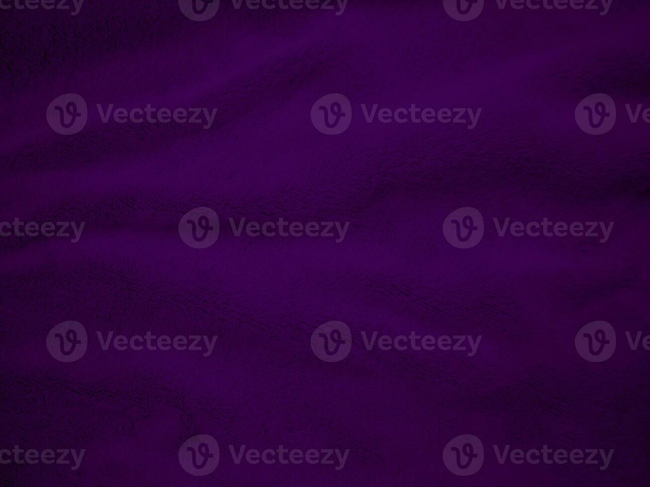 Purple clean wool fabric texture background. light natural sheep wool. Violet seamless cotton. texture of fluffy fur for designers. close-up fragment wool carpet. photo