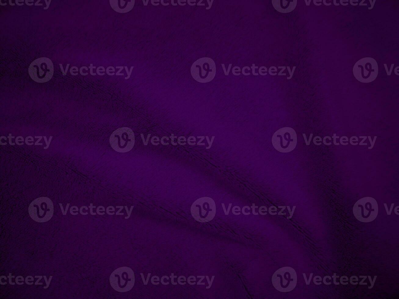 Purple clean wool fabric texture background. light natural sheep wool. Violet seamless cotton. texture of fluffy fur for designers. close-up fragment wool carpet. photo