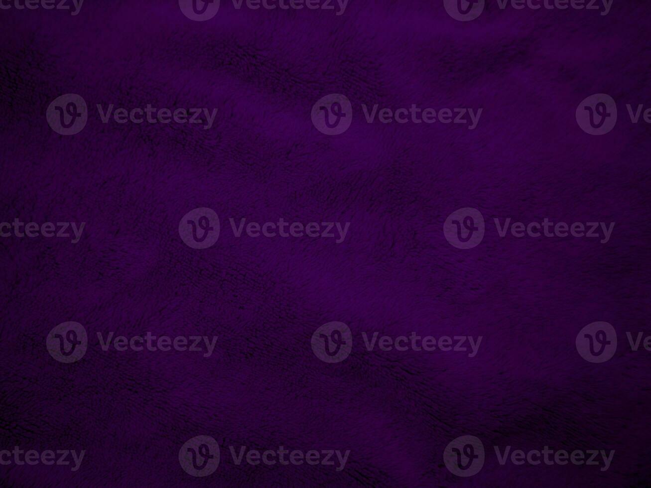 Purple clean wool fabric texture background. light natural sheep wool. Violet seamless cotton. texture of fluffy fur for designers. close-up fragment wool carpet. photo