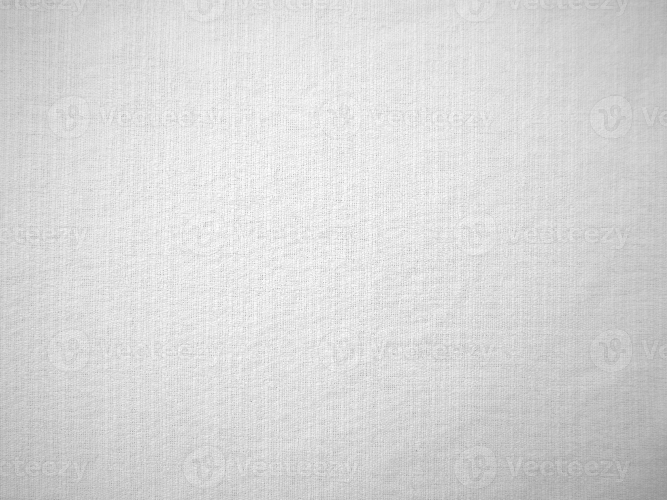 White velvet fabric texture used as background. White cotton background