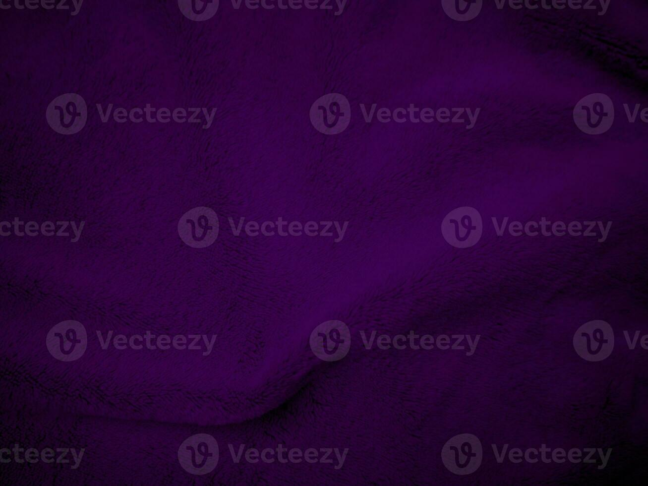 Purple clean wool fabric texture background. light natural sheep wool. Violet seamless cotton. texture of fluffy fur for designers. close-up fragment wool carpet. photo