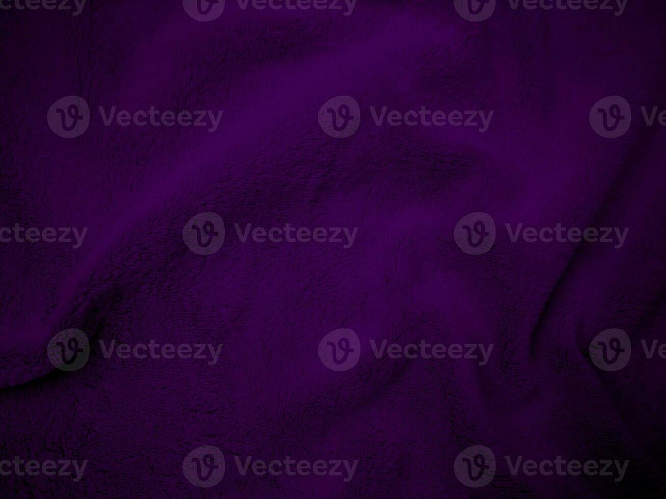 Purple clean wool fabric texture background. light natural sheep wool. Violet seamless cotton. texture of fluffy fur for designers. close-up fragment wool carpet. photo