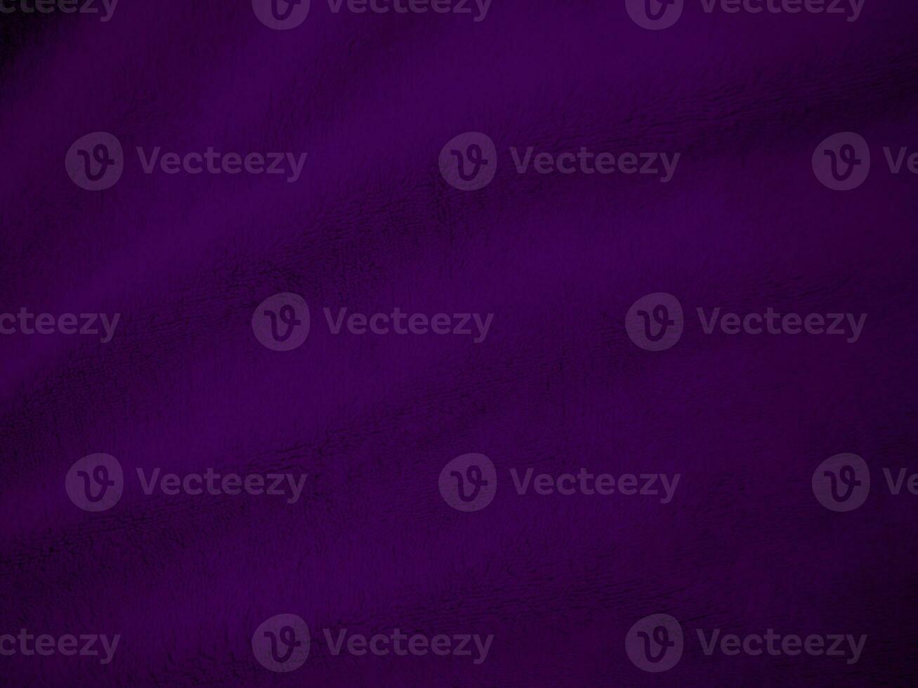 Purple clean wool fabric texture background. light natural sheep wool. Violet seamless cotton. texture of fluffy fur for designers. close-up fragment wool carpet. photo