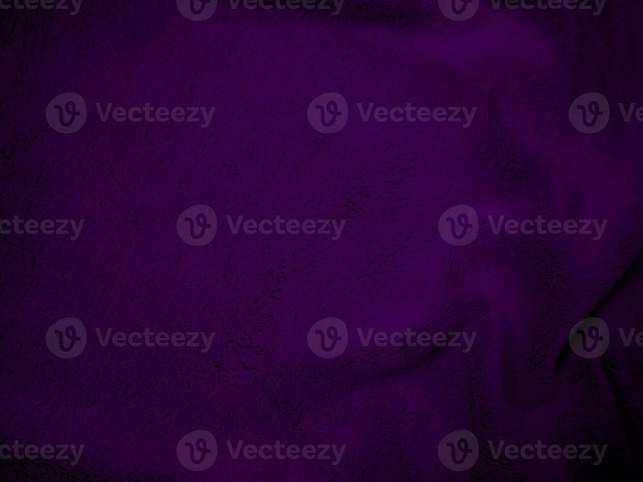 Purple clean wool fabric texture background. light natural sheep wool. Violet seamless cotton. texture of fluffy fur for designers. close-up fragment wool carpet. photo