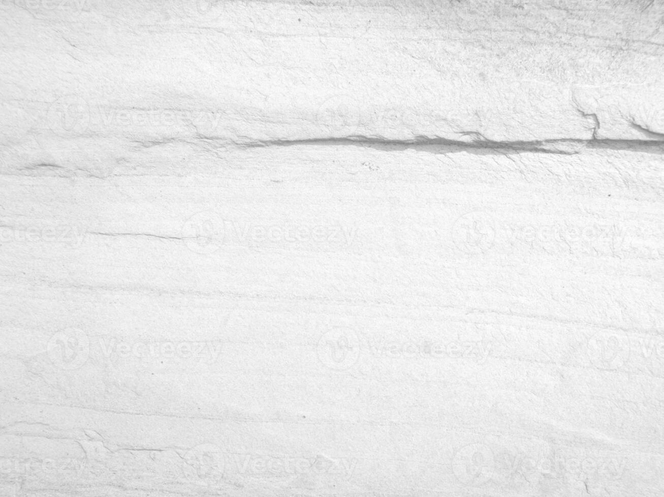 Surface of the white stone texture rough, gray-white tone. Use this for wallpaper or background image. There is a blank space for text. photo