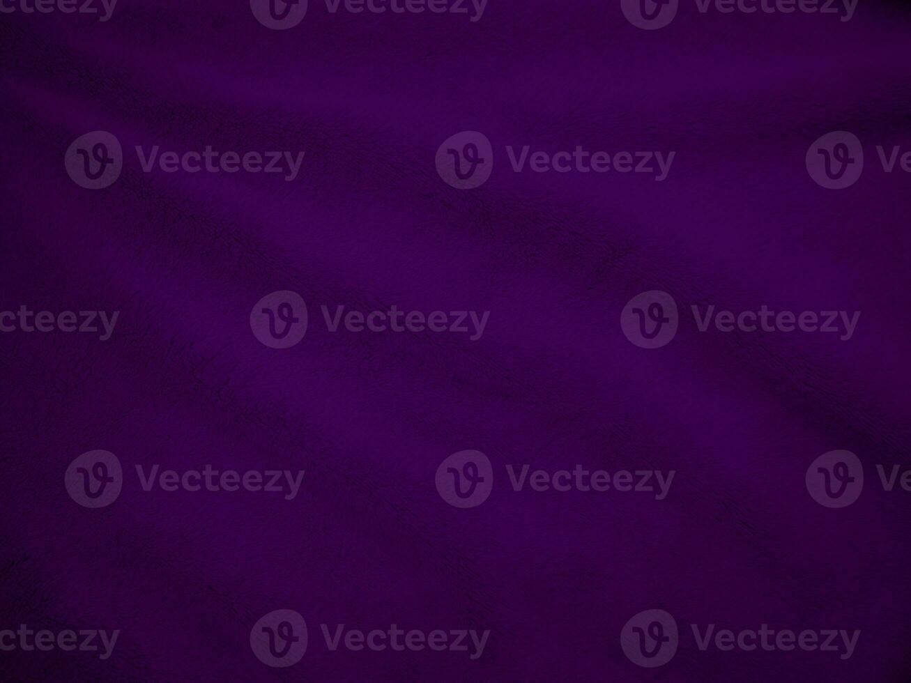 Purple clean wool fabric texture background. light natural sheep wool. Violet seamless cotton. texture of fluffy fur for designers. close-up fragment wool carpet. photo