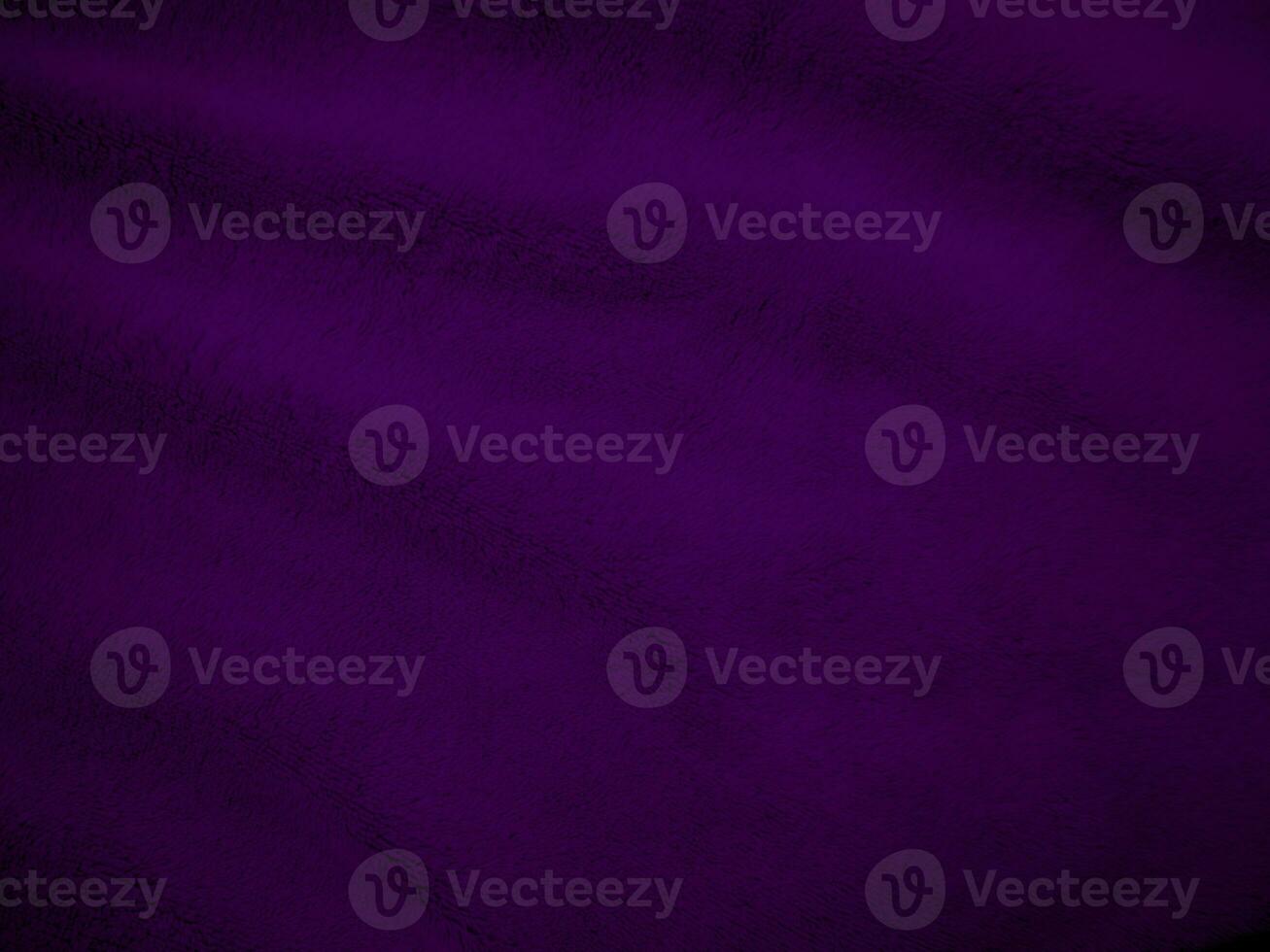 Purple clean wool fabric texture background. light natural sheep wool. Violet seamless cotton. texture of fluffy fur for designers. close-up fragment wool carpet. photo