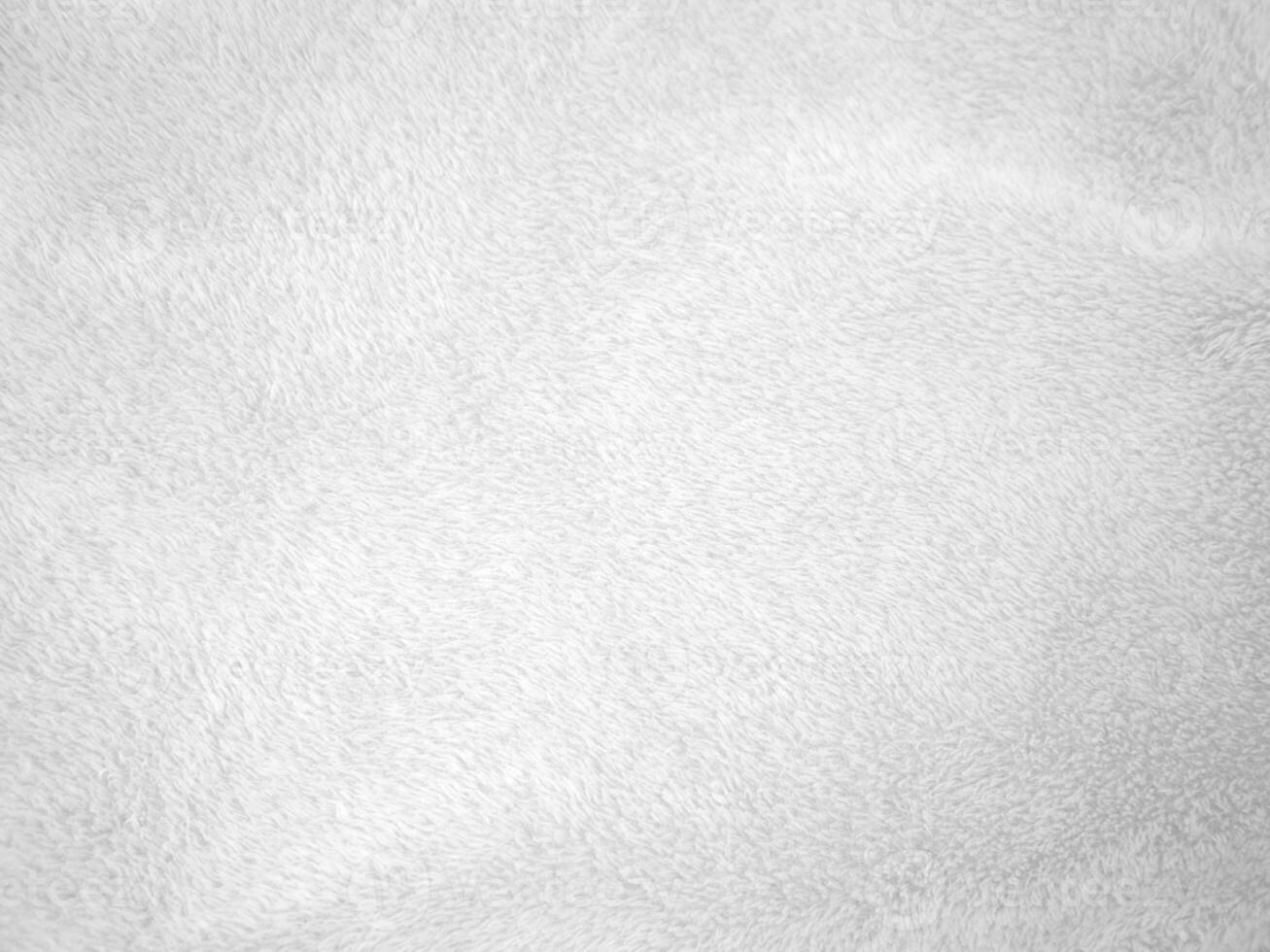 White clean wool texture background. light natural sheep wool. white seamless cotton. texture of fluffy fur for designers. close-up fragment white wool carpet. photo