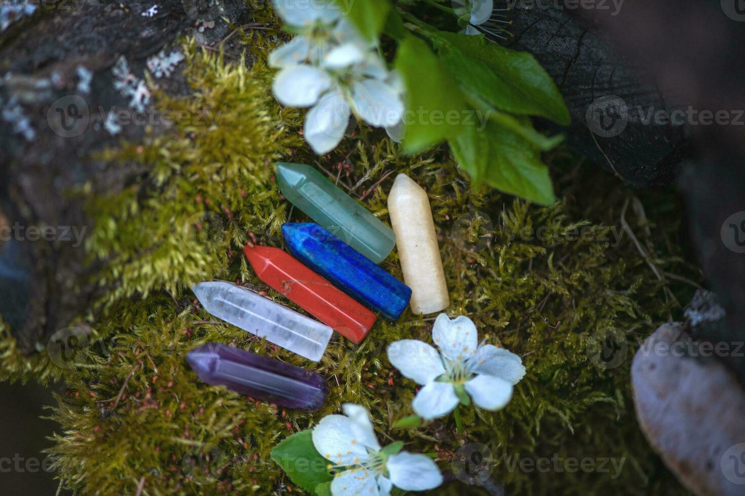 crystals on green natural background. Magic Healing gemstone mineral for meditation, Crystal Ritual, Witchcraft, Chakra relaxation. spiritual esoteric  practice, quartz minerals for healing, photo