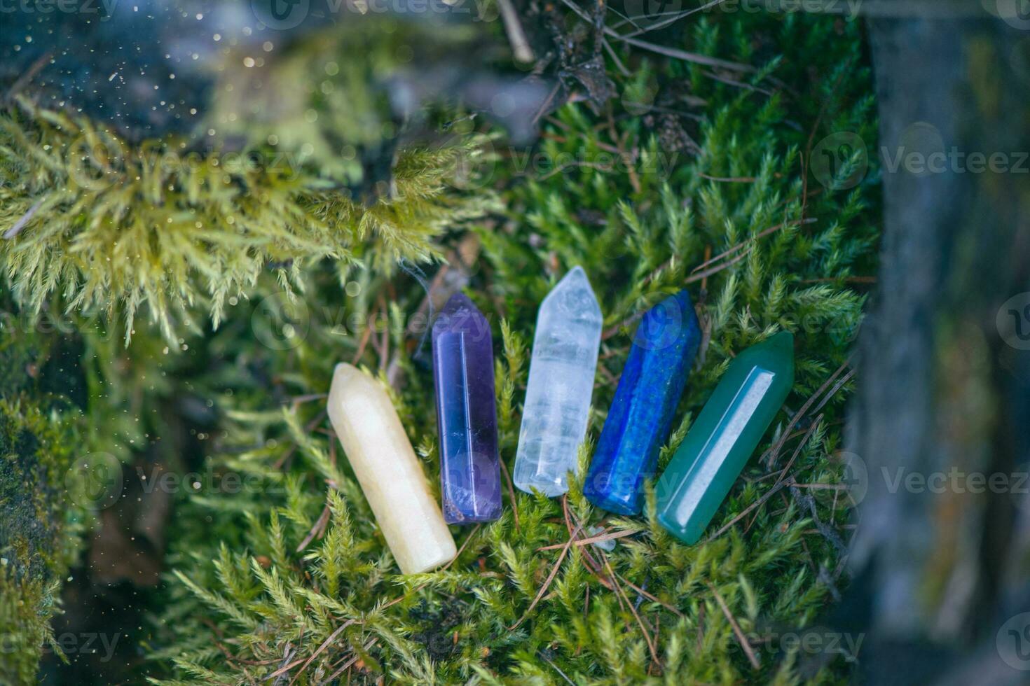 crystals on green natural background. Magic Healing gemstone mineral for meditation, Crystal Ritual, Witchcraft, Chakra relaxation. spiritual esoteric  practice, quartz minerals for healing, photo