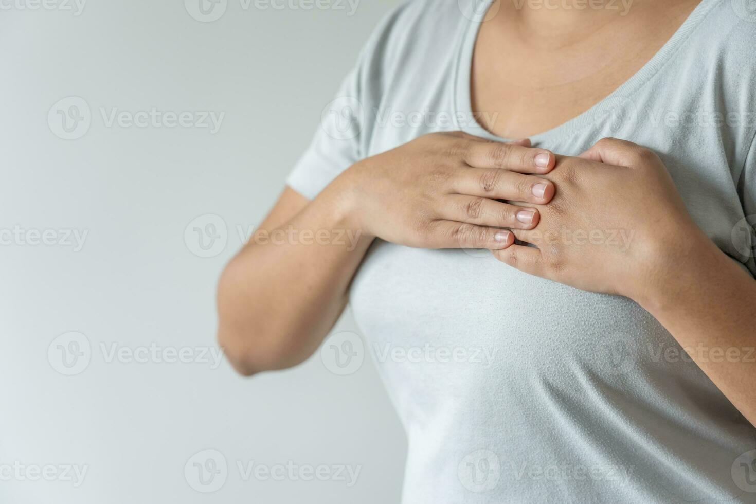 Obesity woman gain overweight and fat causing to have high risk of heart attack photo