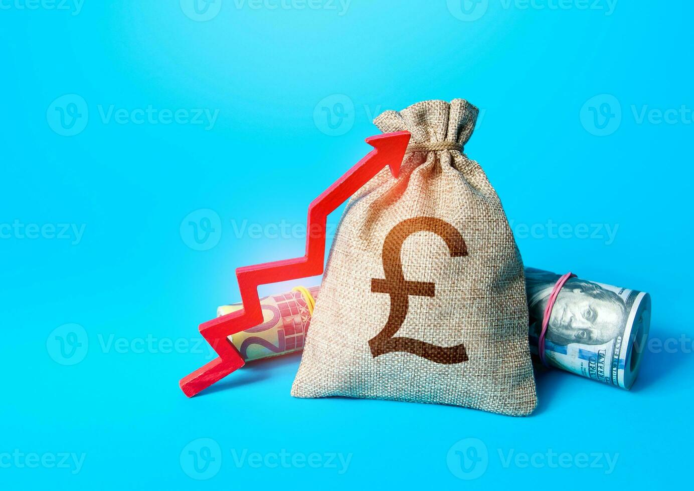 British pound sterling money bag and red up arrow. Rise in profits. Increase in the deposit rate. Increase income and business efficiency. Inflation acceleration. Investments. Economic growth, GDP. photo