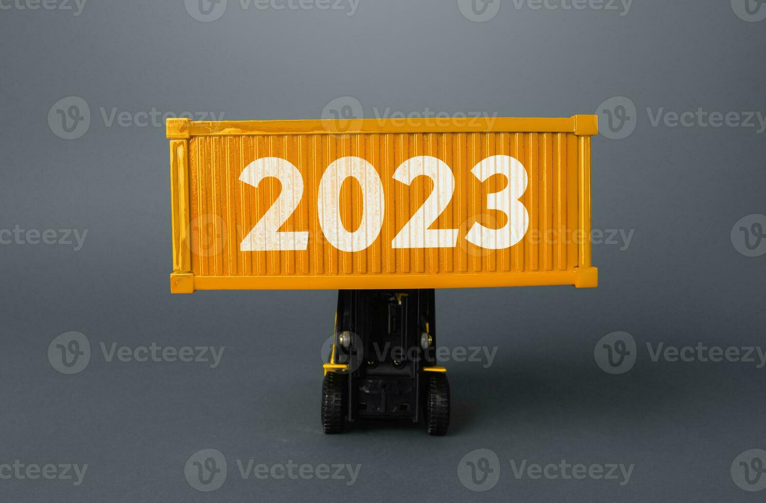 Forklift with a shipping container with 2023. Analytics forecasting of freight traffic next year. Develop infrastructure projects. Express delivery, goods transportation. Logistics. Import export. photo