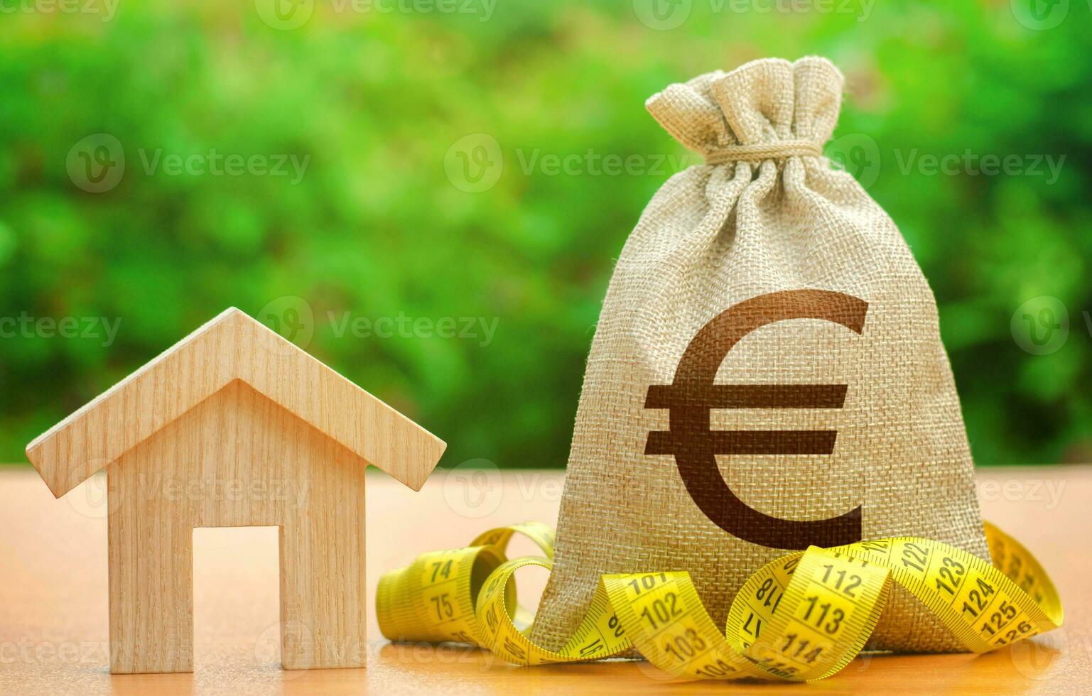 House and euro money bag. Mortgage loan calculation. Real estate