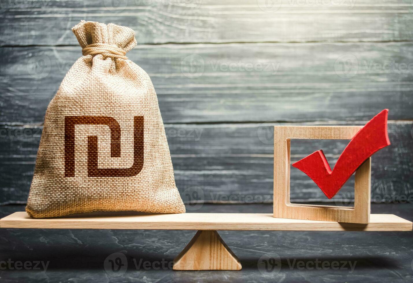 Red vote tick and a israeli shekel money bag on scales. Corruption risks. Concept of lobbying for decisions and laws. Estimating cost of making a decision and consequences in the future. photo
