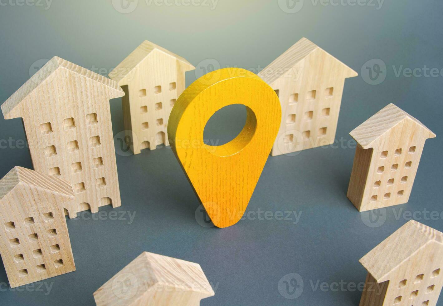 Yellow location indicator among houses. Delivery. Tracking and navigation. Internet of things, city management and city services municipal. Celebrations and events. Business advertising. photo