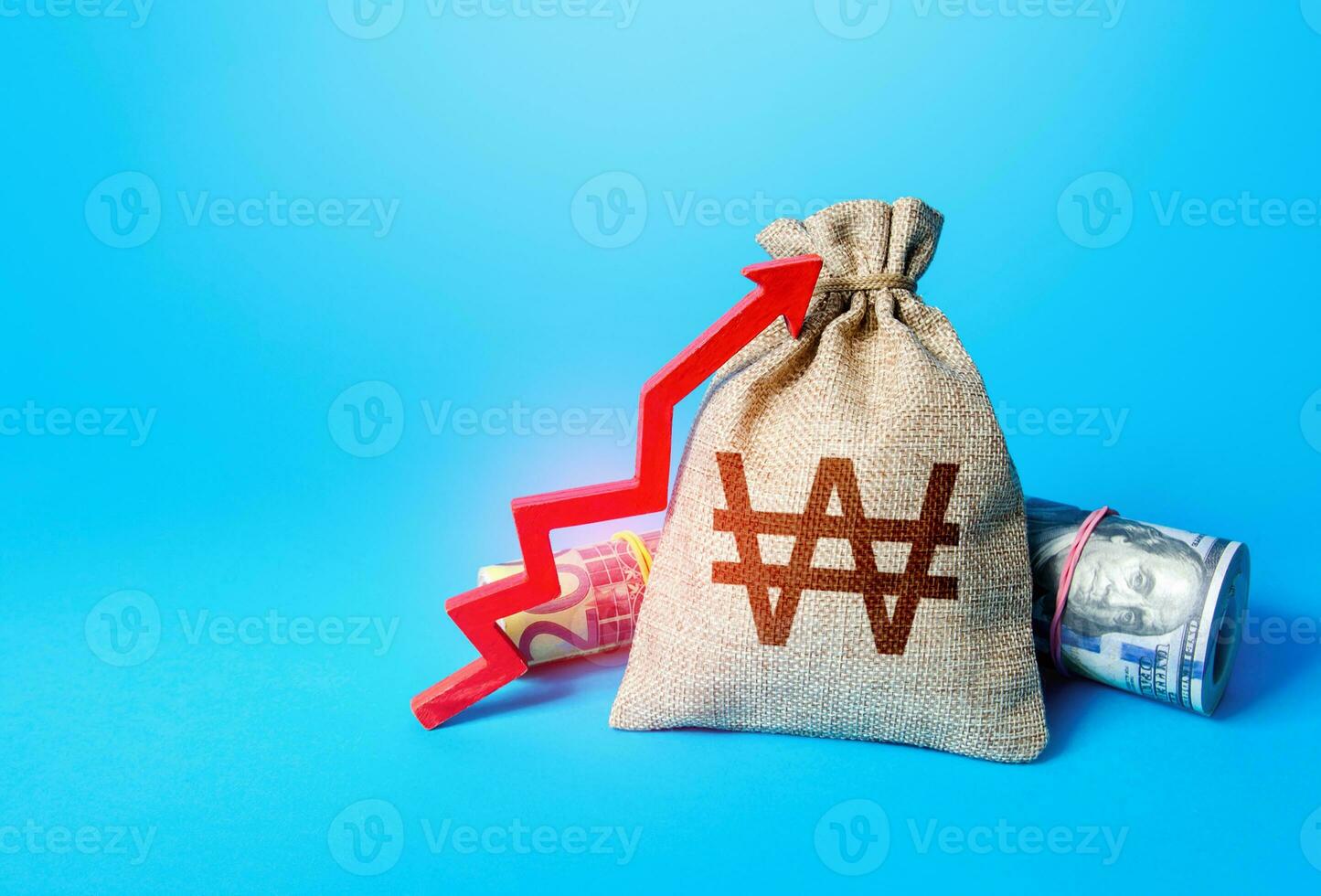 South korean won money bag and red up arrow. Economic growth. Increase in the deposit rate. Rise in profits, budget fees. Increase income and business efficiency. Inflation acceleration. Investments. photo