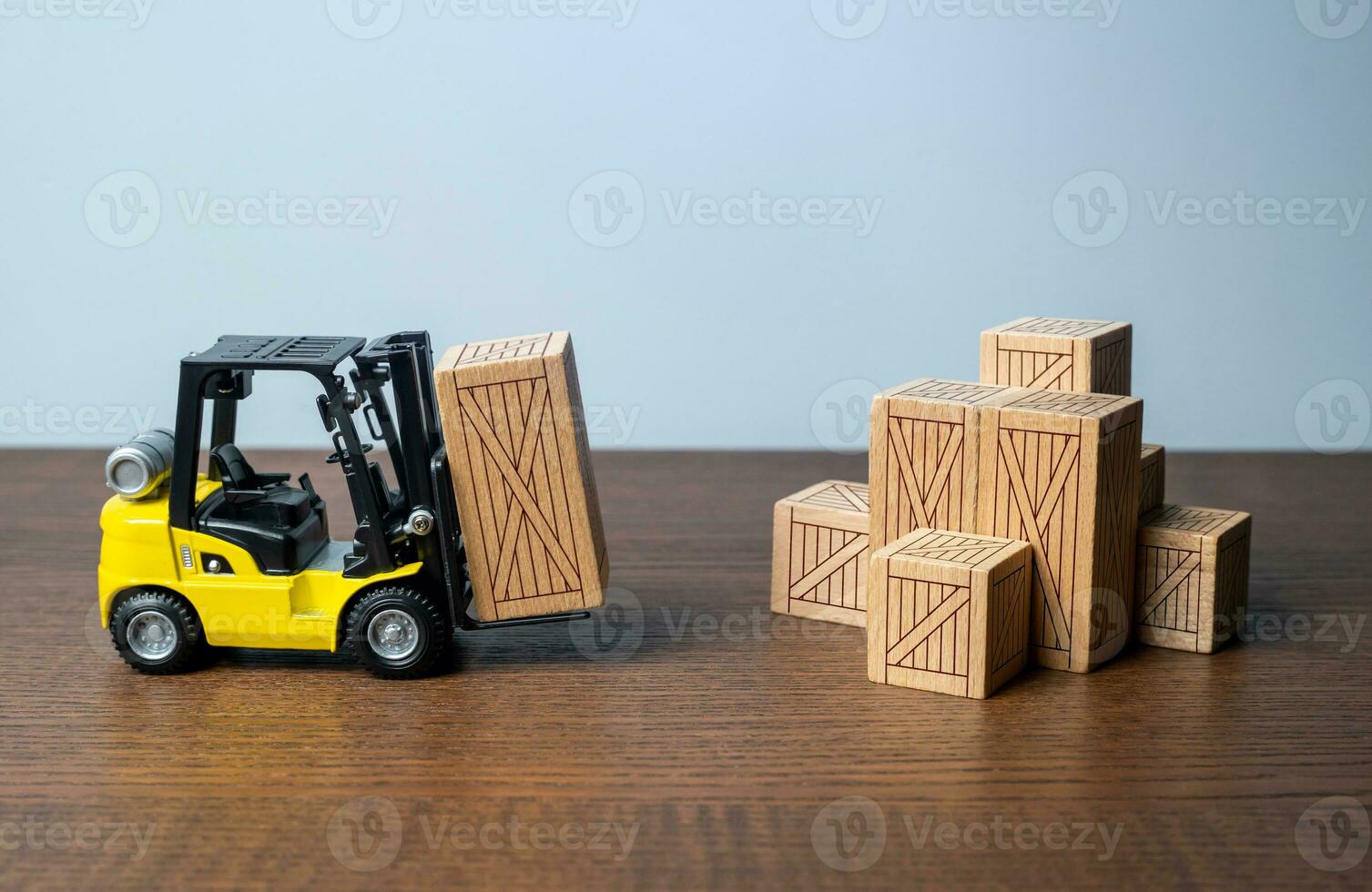 Forklift and wooden crates. Logistic infrastructure and warehousing services. Transportation industry. Trade Shipping logistics. Supply by products and goods. Hub for the storage and movement of goods photo