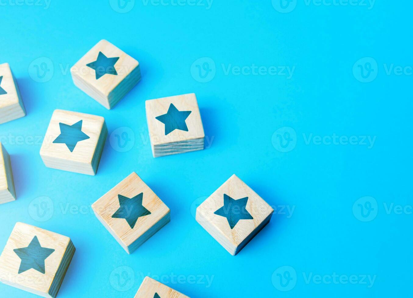 Scattered star blocks on a blue background. Popularity and fame. Feedback. Inspection, review. Benefits, positive things. New features. Ratings and reviews. Parties and celebrate events. photo