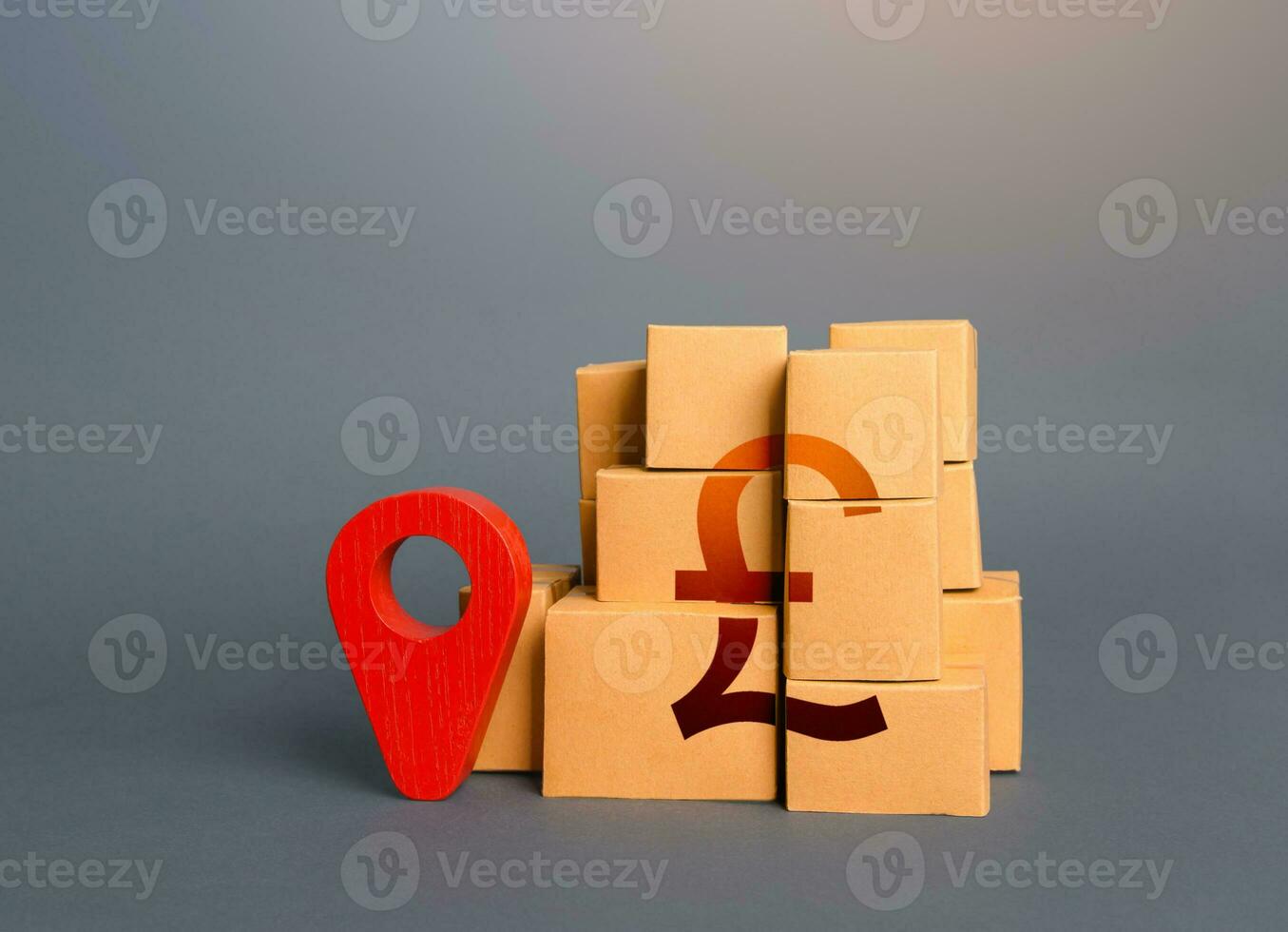 Boxes with british pound sterling symbol and red location pin. Domestic manufacturer. Supply distribution of goods. Transportation delivering logistics, management. Trade in goods. Import export. photo