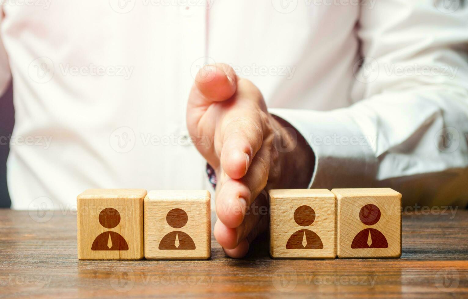 Team disbandment. Separation of staff. Reorganization and optimization of the business structure. Fragmentation of experienced teams to create new ones. Mass layoffs. Business downsizing photo