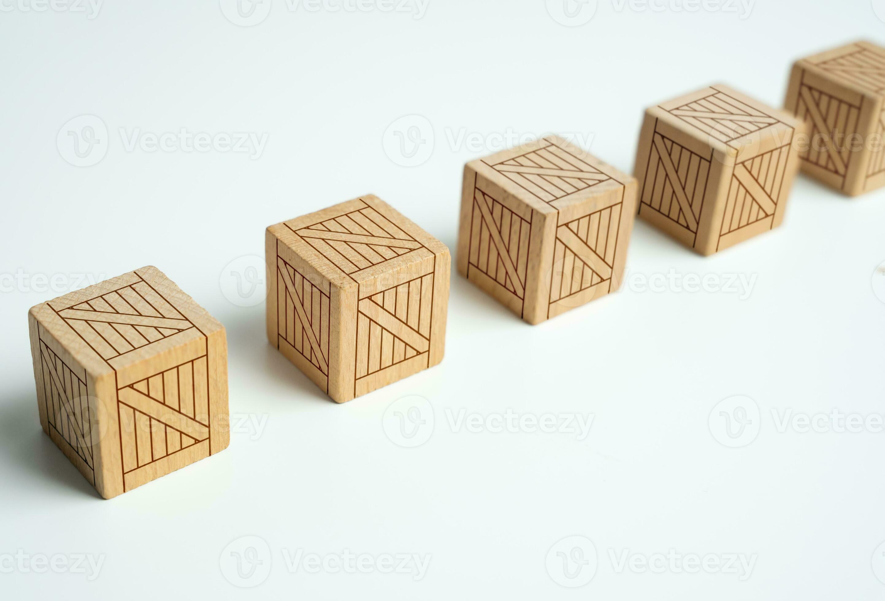 Wooden boxes standing in a row. Production and freight of goods. Neatly