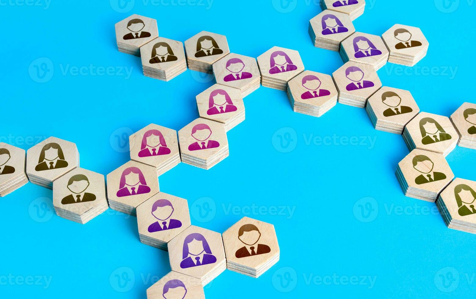 People form a chain of communication. Cooperation for solving tasks. Networking. Multiculturalism. Connecting groups of people, uniting around idea. Assistance and collaboration. Unity and diversity. photo