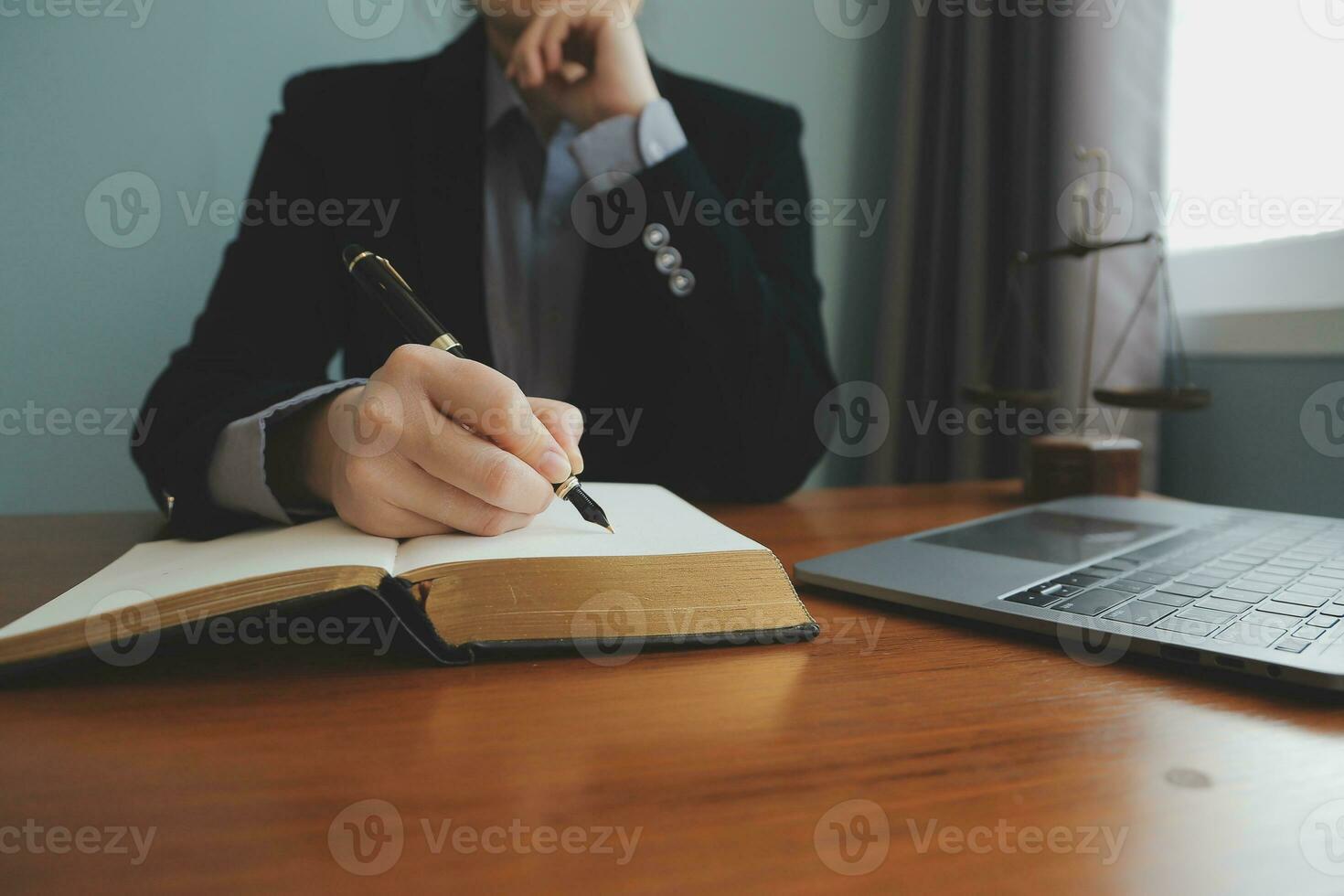 Business and lawyers discussing contract papers with brass scale on desk in office. Law, legal services, advice, justice and law concept picture with film grain effect photo