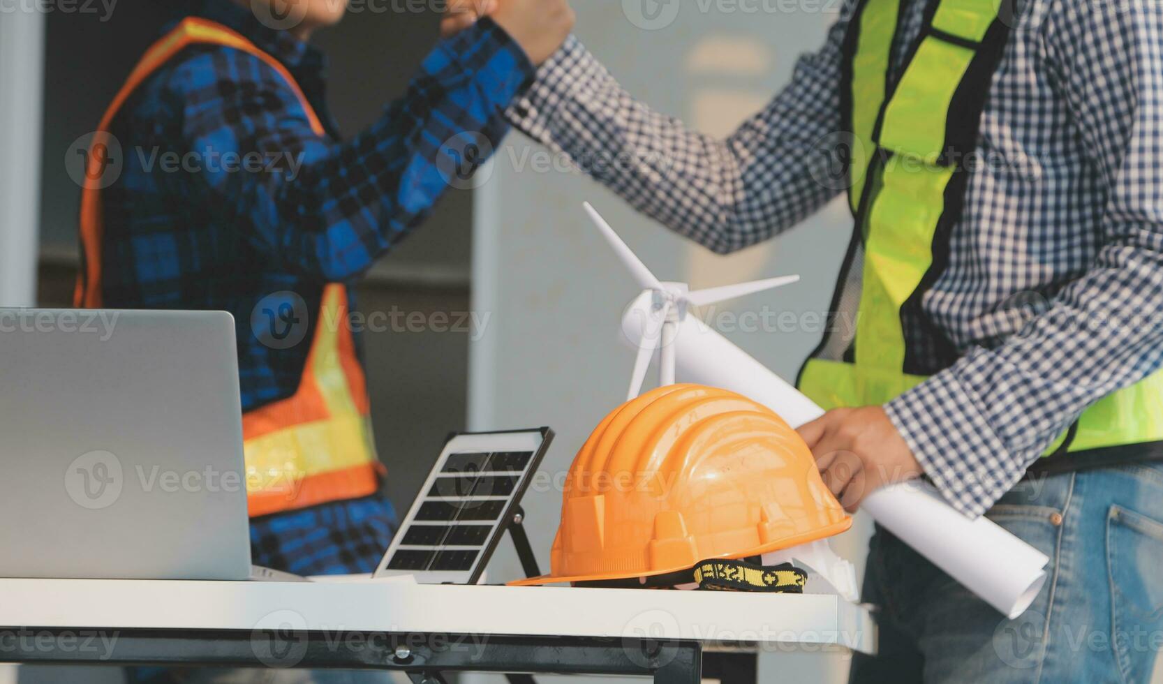 Professional Mechanical Engineer team Working on Personal Computer at Metal lathe industrial manufacturing factory. Engineer Operating lathe Machinery. Product quality Inspection photo