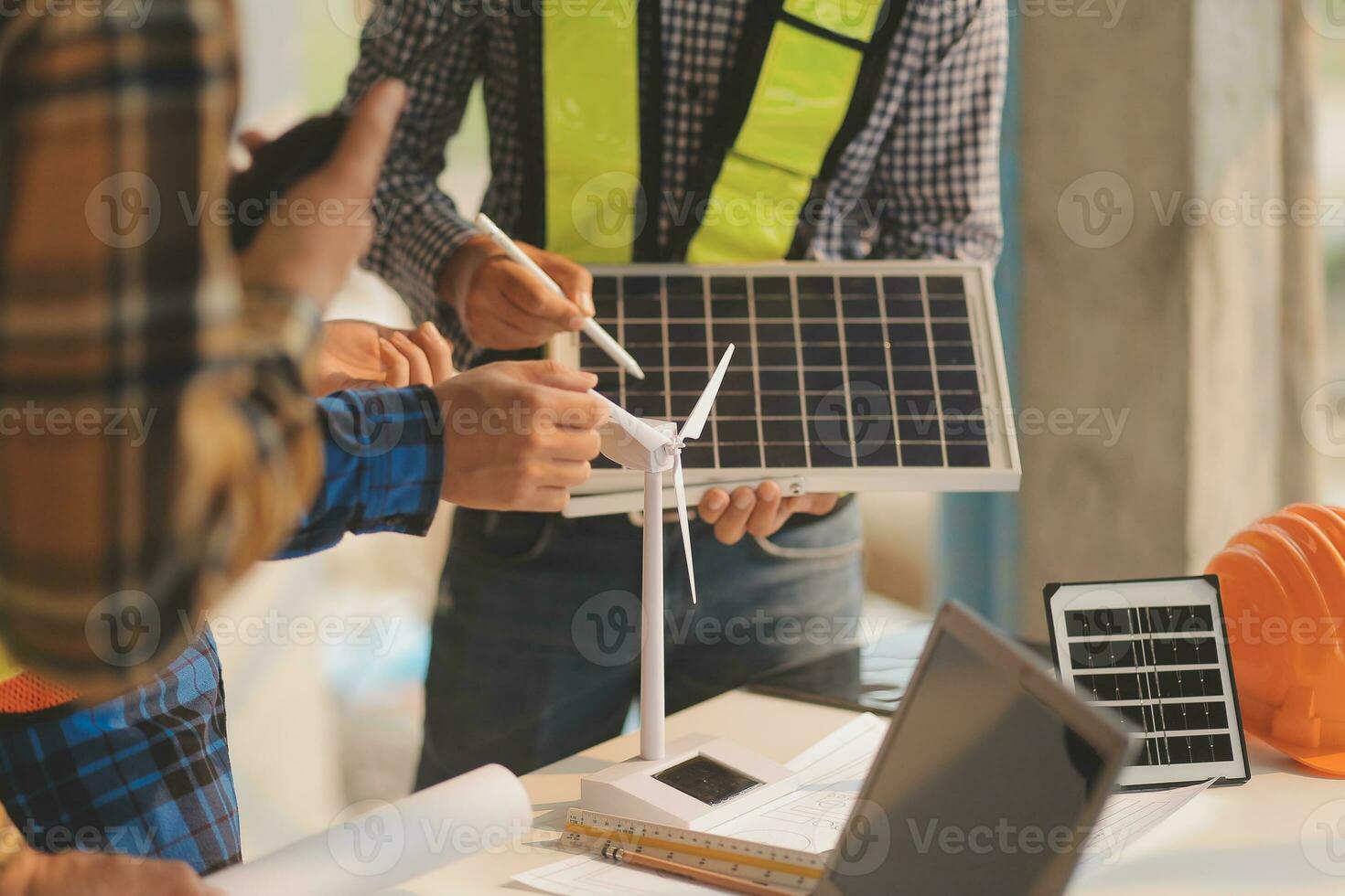 Professional Mechanical Engineer team Working on Personal Computer at Metal lathe industrial manufacturing factory. Engineer Operating lathe Machinery. Product quality Inspection photo