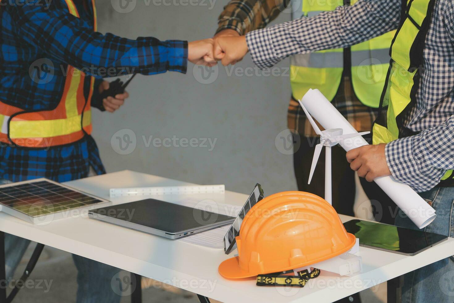 Professional Mechanical Engineer team Working on Personal Computer at Metal lathe industrial manufacturing factory. Engineer Operating lathe Machinery. Product quality Inspection photo