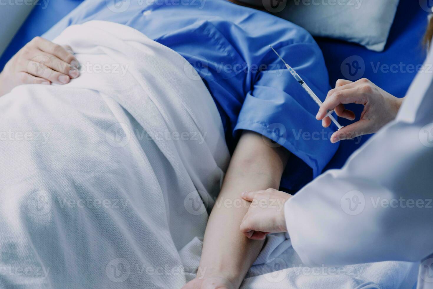 doctor check up after surgery. doctor touching patient hand and consoling. photo