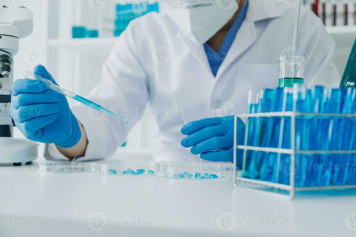 hand of scientist with test tube and flask in medical chemistry lab blue banner background photo