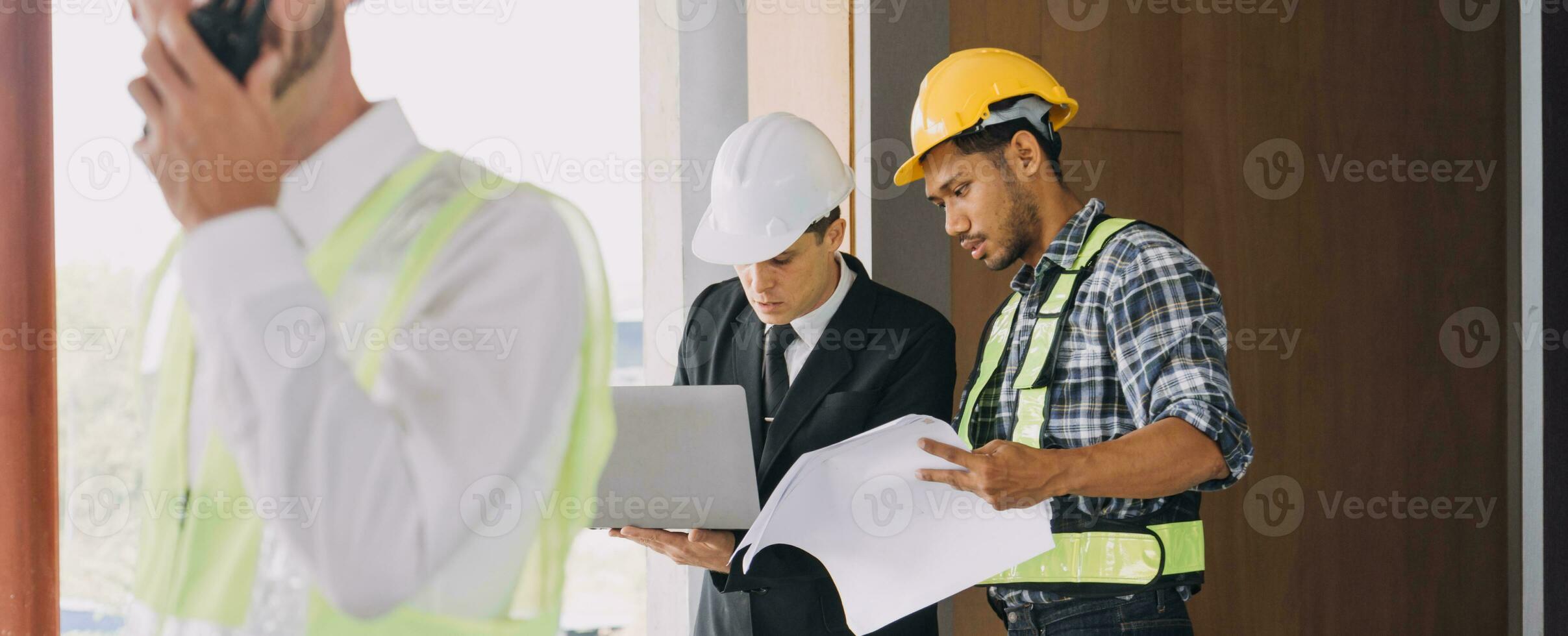 Professional Mechanical Engineer team Working on Personal Computer at Metal lathe industrial manufacturing factory. Engineer Operating lathe Machinery. Product quality Inspection photo