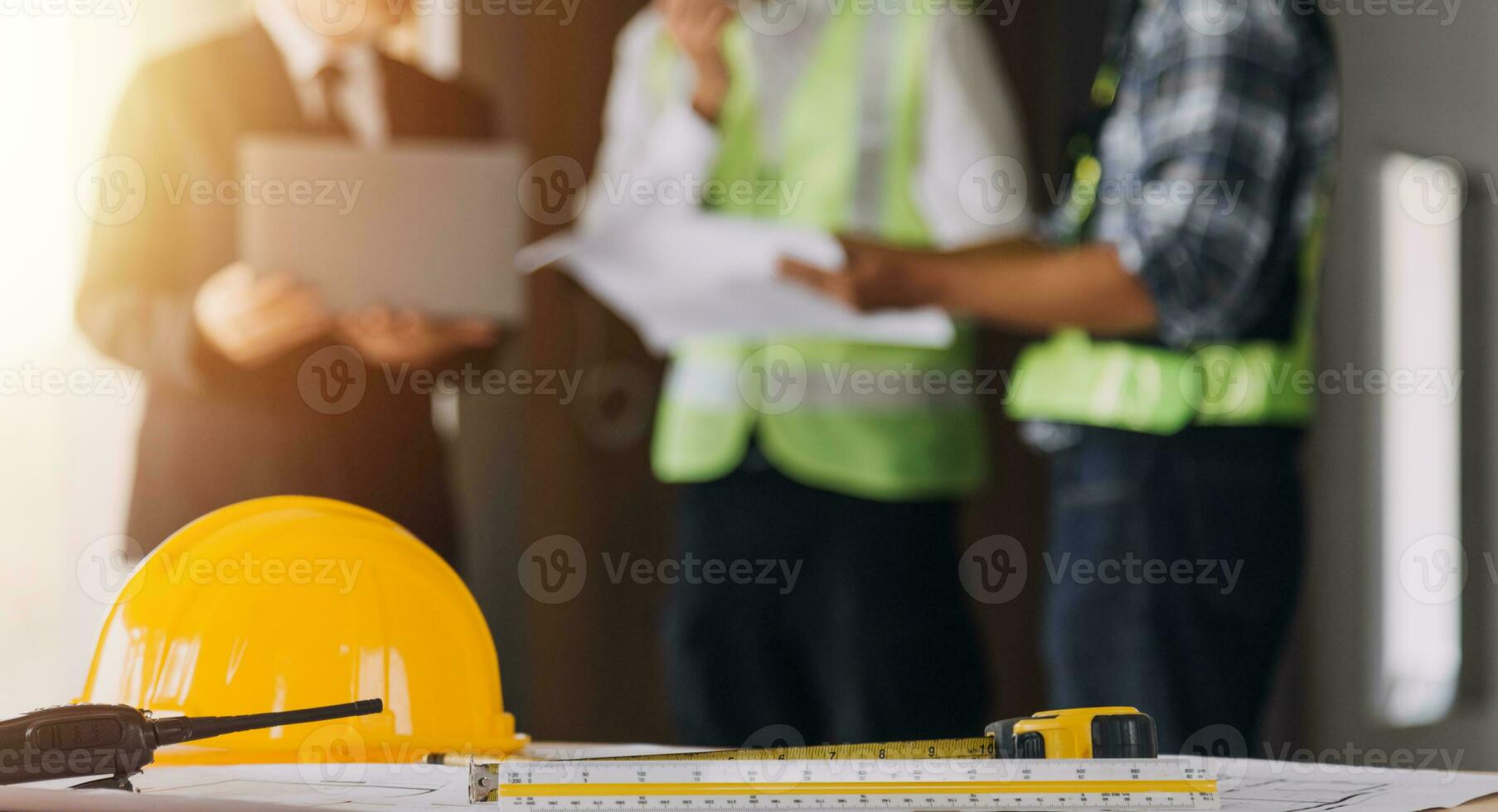 Professional Mechanical Engineer team Working on Personal Computer at Metal lathe industrial manufacturing factory. Engineer Operating lathe Machinery. Product quality Inspection photo