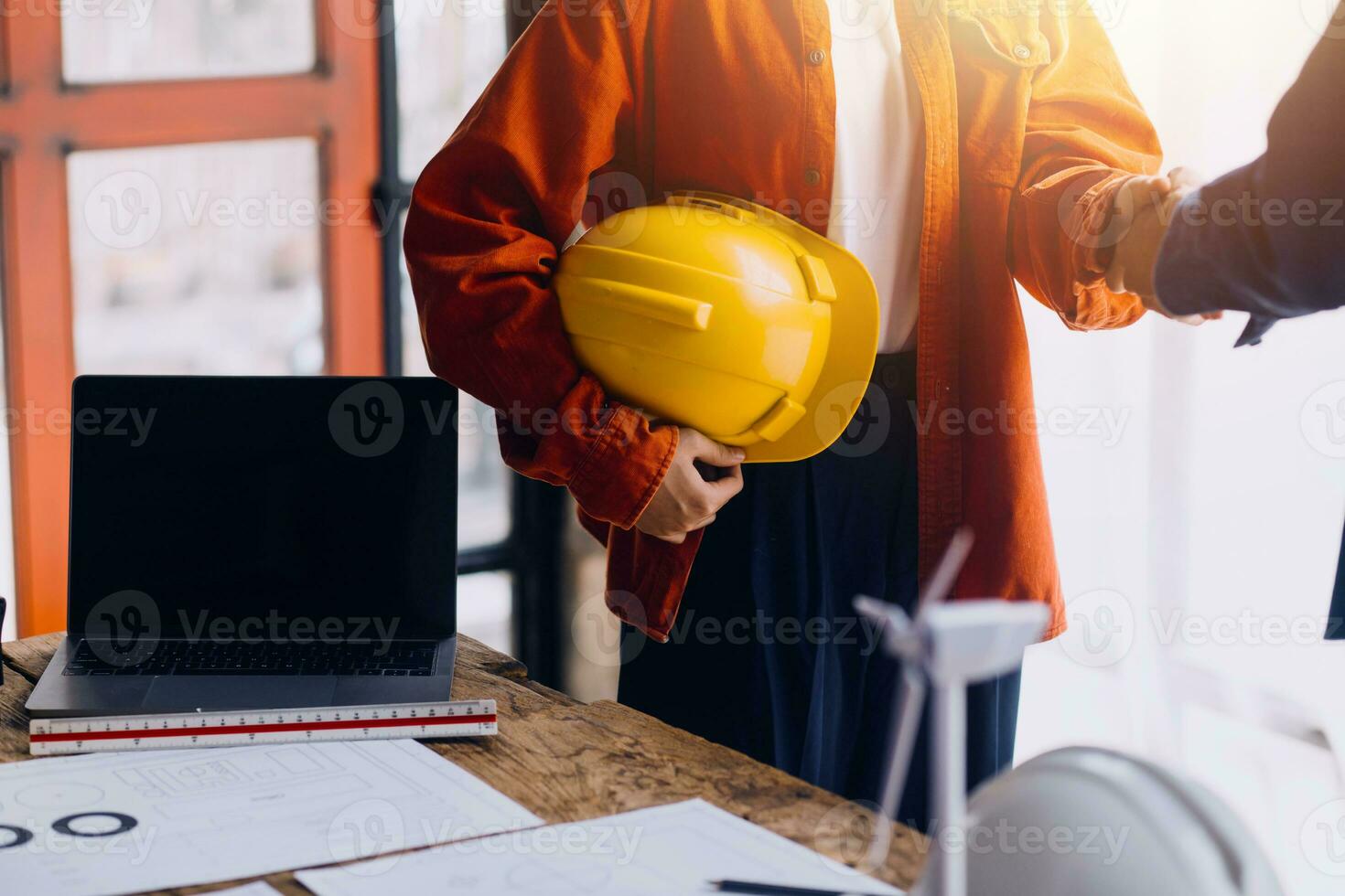 Professional Mechanical Engineer team Working on Personal Computer at Metal lathe industrial manufacturing factory. Engineer Operating lathe Machinery. Product quality Inspection photo
