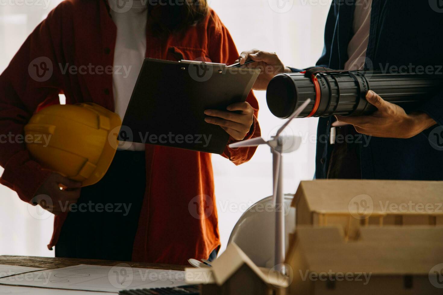 Professional Mechanical Engineer team Working on Personal Computer at Metal lathe industrial manufacturing factory. Engineer Operating lathe Machinery. Product quality Inspection photo