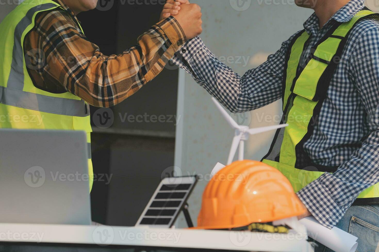 Professional Mechanical Engineer team Working on Personal Computer at Metal lathe industrial manufacturing factory. Engineer Operating lathe Machinery. Product quality Inspection photo