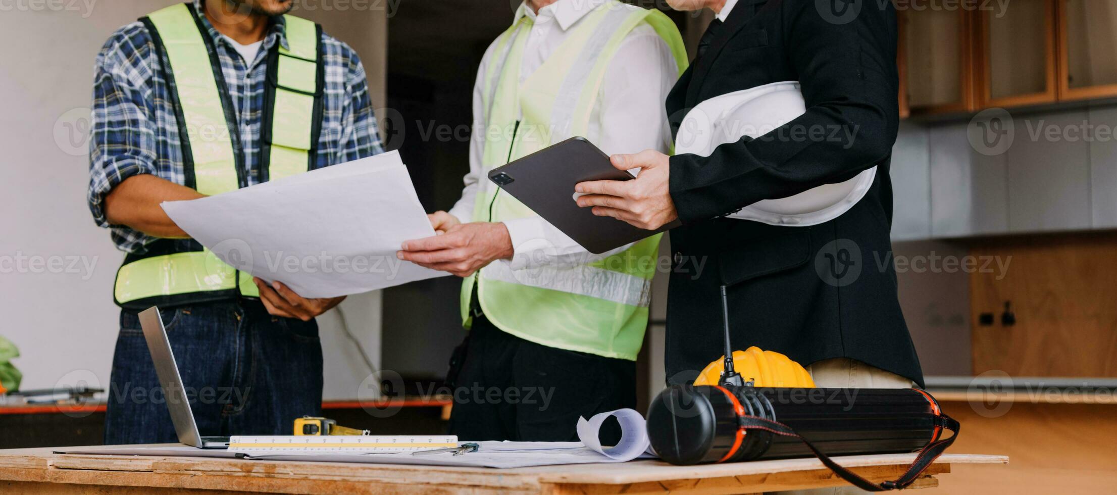 Professional Mechanical Engineer team Working on Personal Computer at Metal lathe industrial manufacturing factory. Engineer Operating lathe Machinery. Product quality Inspection photo