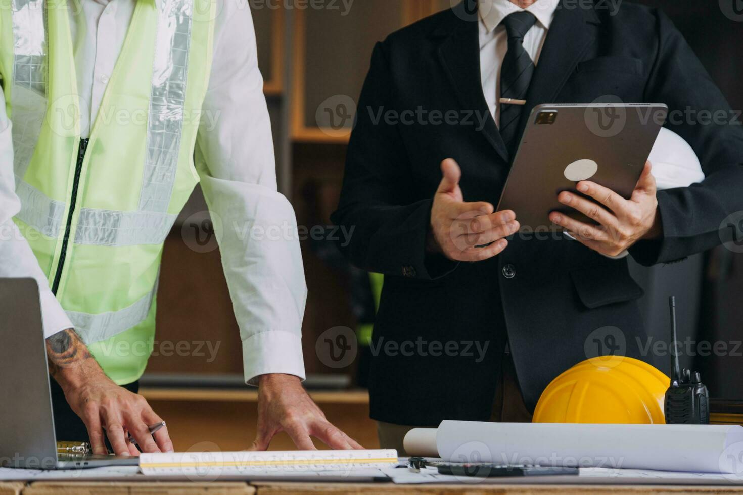 Professional Mechanical Engineer team Working on Personal Computer at Metal lathe industrial manufacturing factory. Engineer Operating lathe Machinery. Product quality Inspection photo