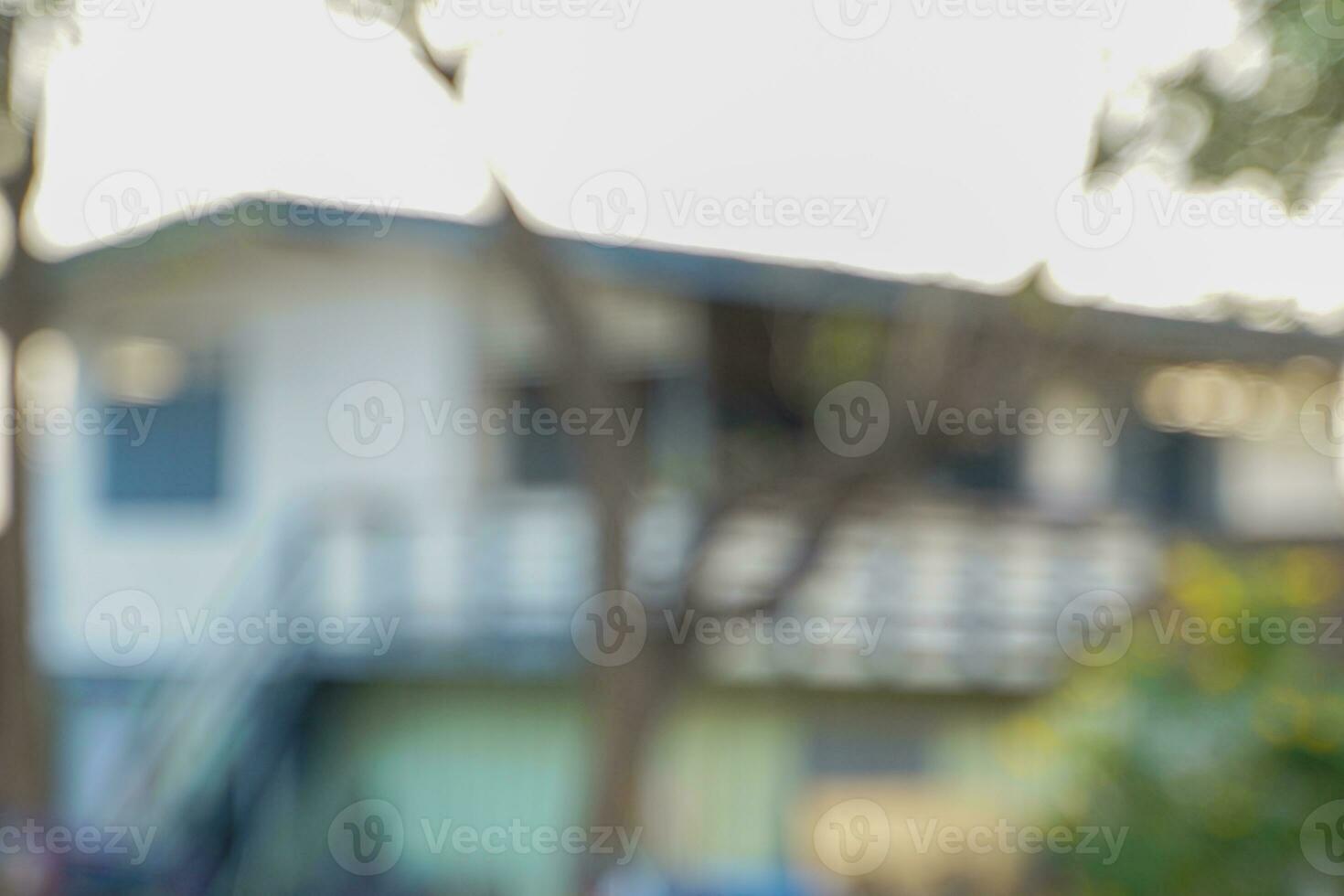 Blurred background of a single storey wooden house. Concept background from nature, soft and selective focus. photo