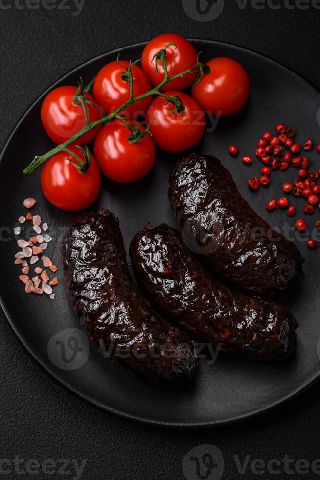 Delicious black blood sausage or black pudding with spices and herbs photo