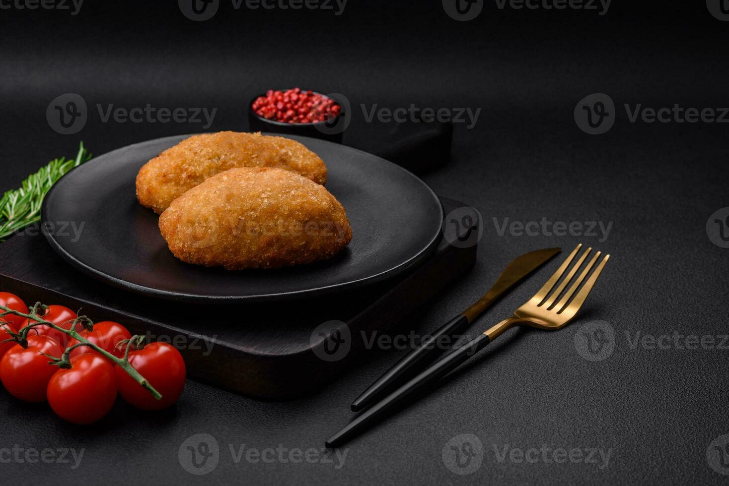 Delicious baked cutlet breaded with spices, salt and herbs photo