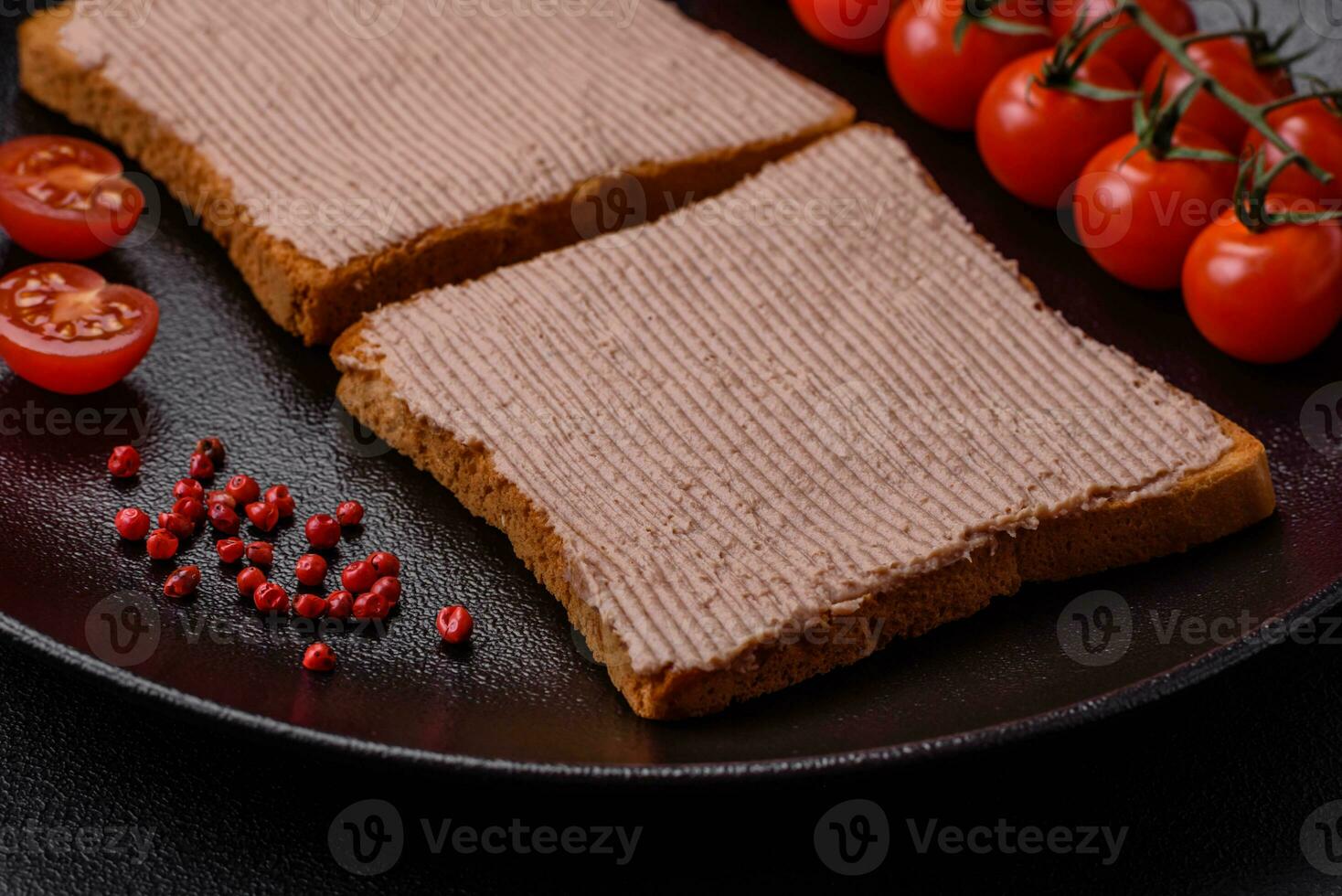 Delicious crispy toast with chicken or goose pate with salt and spices photo