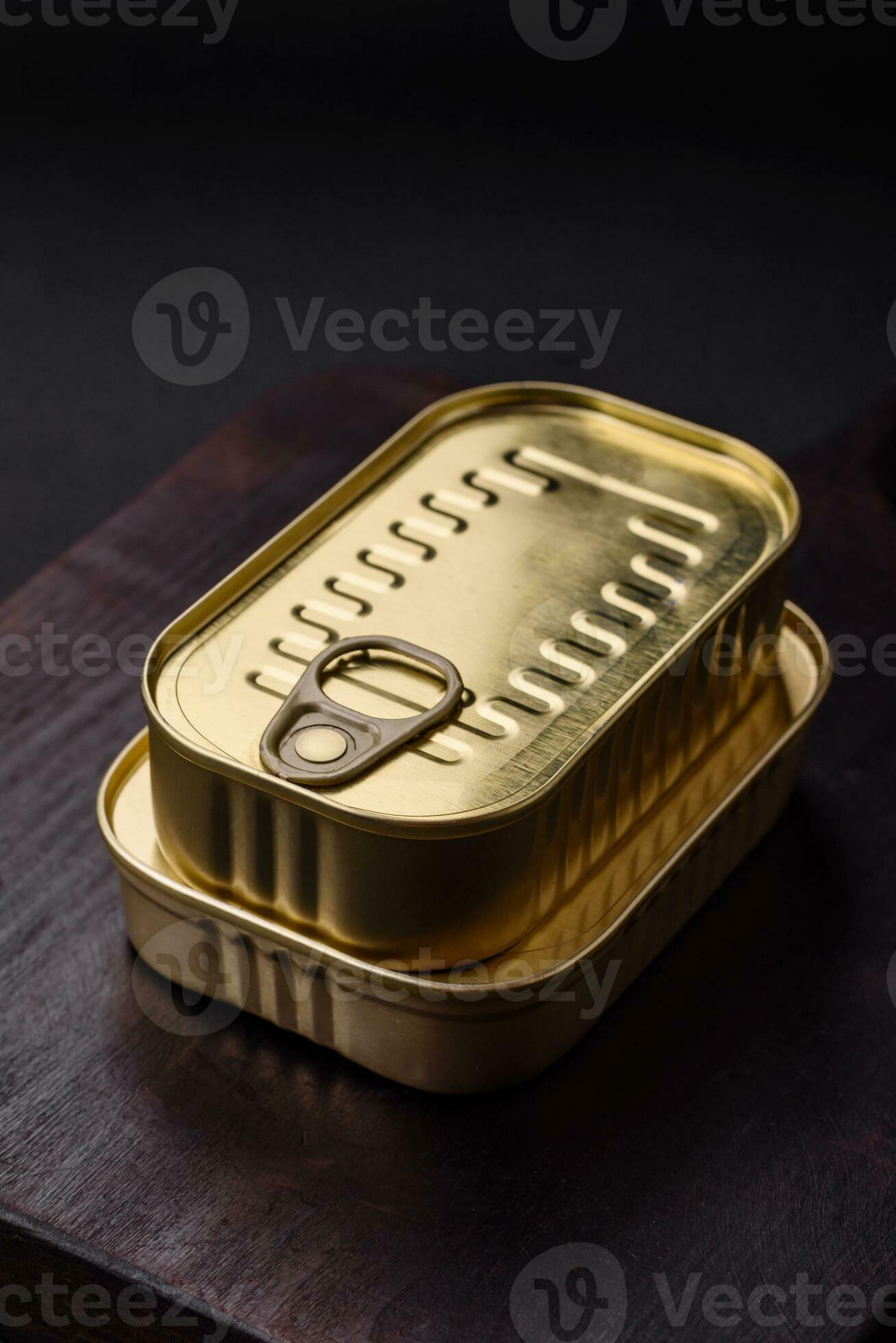 Tin or aluminum rectangular can of canned food with a key 24119436